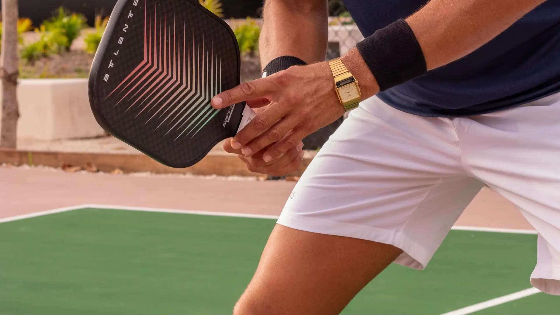 A pickleball player ready at the kitchen line