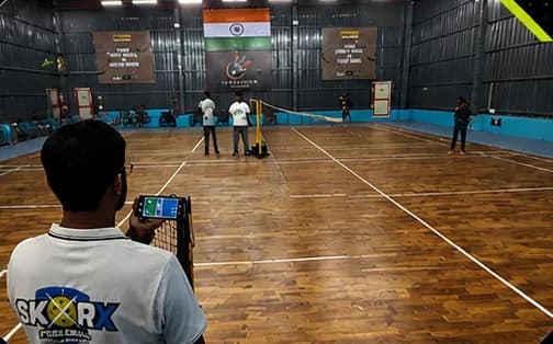 SkorX scorer at an indoor tournament